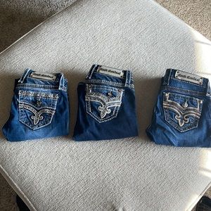 Two pairs are skinny jeans - one pair are flares all size 25